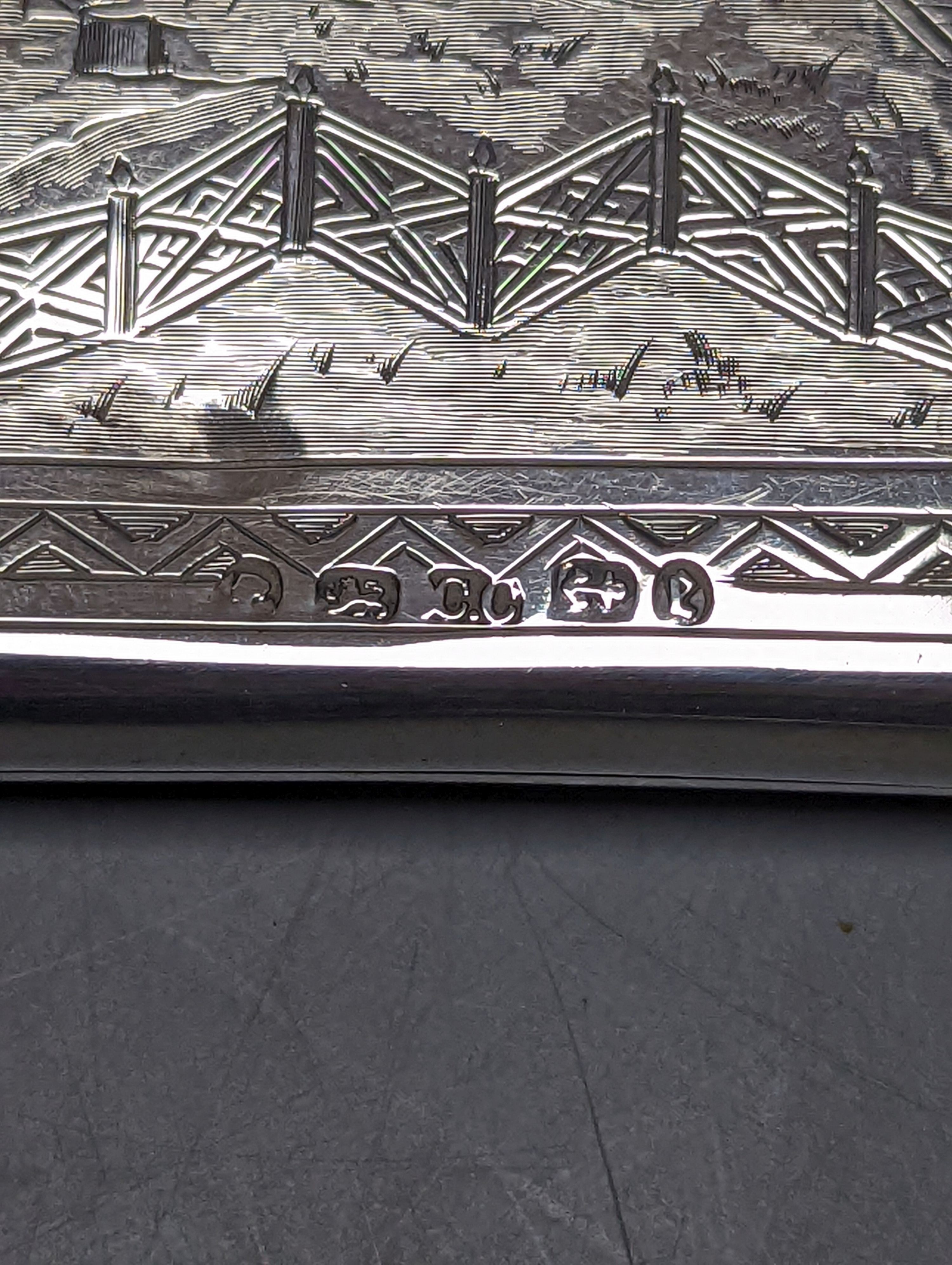 A Victorian silver card purse, with engraved chinoiserie decoration, Colen Hewer Cheshire, Birmingham, 1879, 10.1cm.
